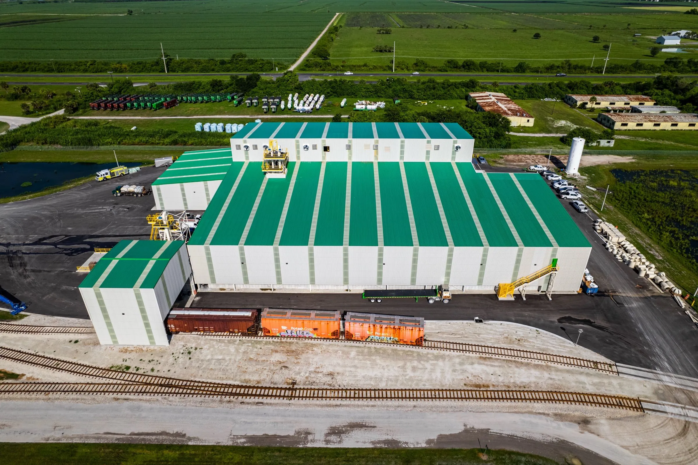 Aerial view of the Moore Haven bag plant, with rail cars in front